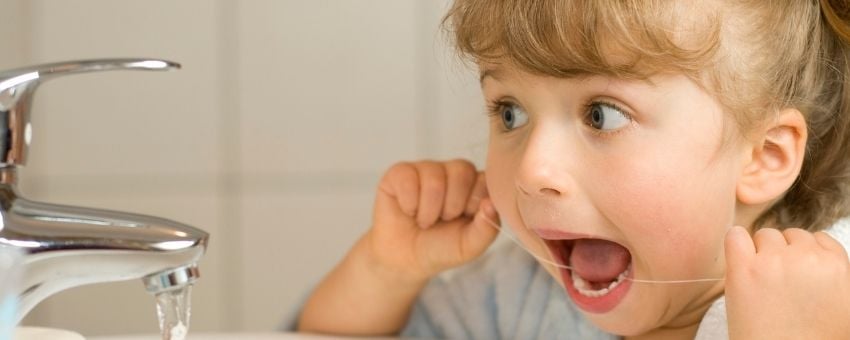 National Children27s Dental Health Month3A Flossing